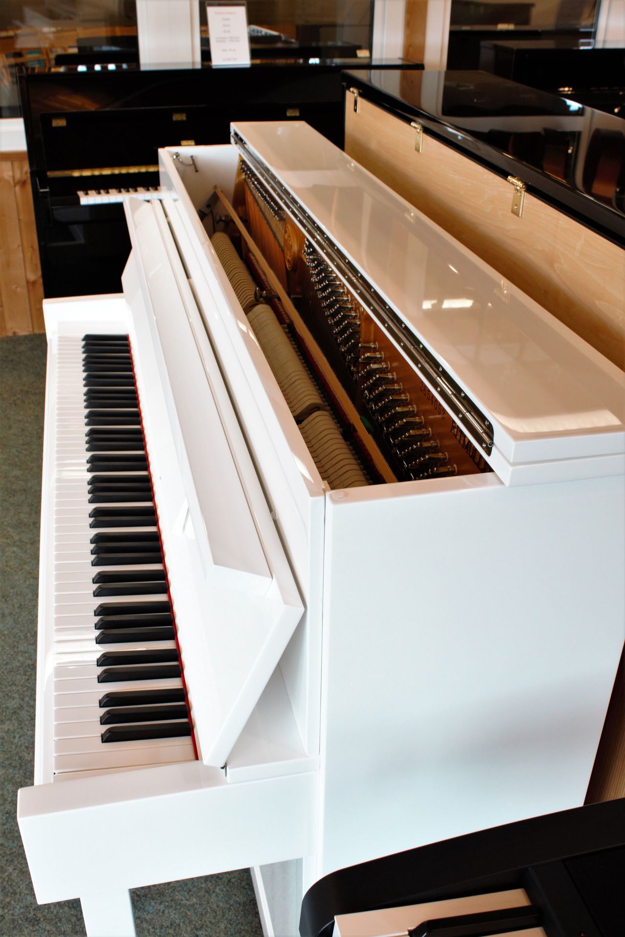 Klavier Ritmüller 110 cm weiß poliert